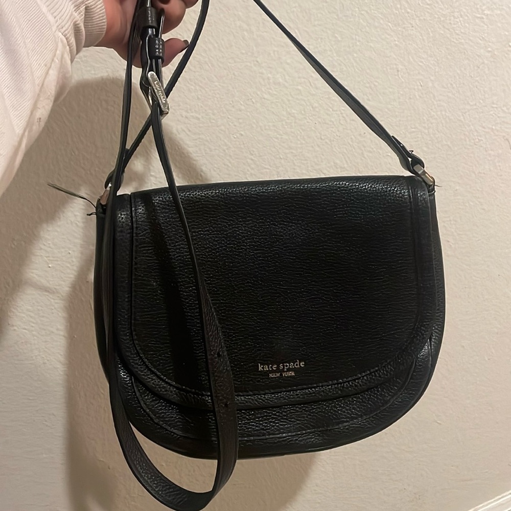 Pebbled leather Kate Spade bad with pink suede interior. Gold hardware